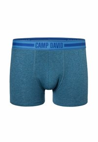 Boxer briefs in cotone elasticizzato blu con una larga cintura blu che presenta il testo "CAMP DAVID". Texture liscia e design aderente.
