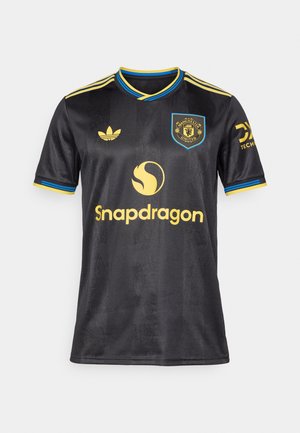 Juodas trumpomis rankovėmis futbolo marškinėliai su mėlynomis ir geltonomis detalėmis, turintys emblemą, "Snapdragon" logotipą ir tekstūruotą raštą.