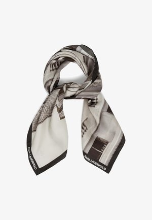 Silkkihuivi, jossa on mustavalkoinen arkkitehtoninen kuosi, kiinteä musta reuna ja "KARL LAGERFELD" -logo reunassa.