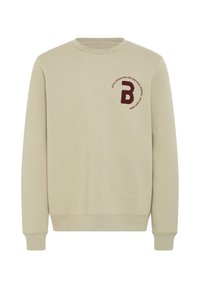 Felpa beige con colletto rotondo, maniche lunghe e polsini a costine. Presenta una lettera 'B' ricamata in bordeaux e un dettaglio testuale circolare.