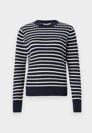 Maglione a righe blu navy con strisce orizzontali bianche, texture a coste, scollatura rotonda e polsini aderenti. Presenta un piccolo logo sul davanti.