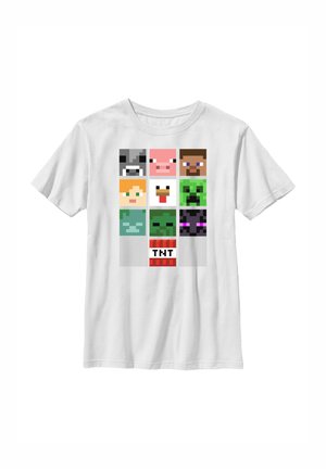 Hvid t-shirt med ni pixelated Minecraft-figurer og en TNT-blok arrangeret i et 3x3 gitter foran.