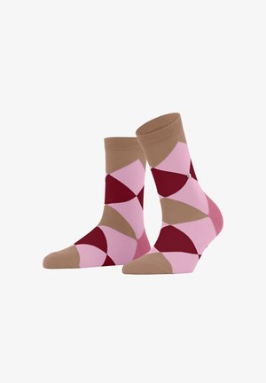 Multicolored socks featuring a geometric pattern with shades of pink, red, and beige. Soft texture with a reinforced toe and ribbed cuff.