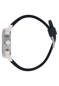 Montre en acier inoxydable avec un bracelet en caoutchouc noir, boîtier rond et deux boutons-poussoirs. Présente une lunette texturée et une couronne texturée.