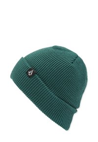 Bonnet en tricot teal avec un motif texturé et côtel�é, et une bordure repliée. Présente une petite étiquette de logo noire sur le côté.