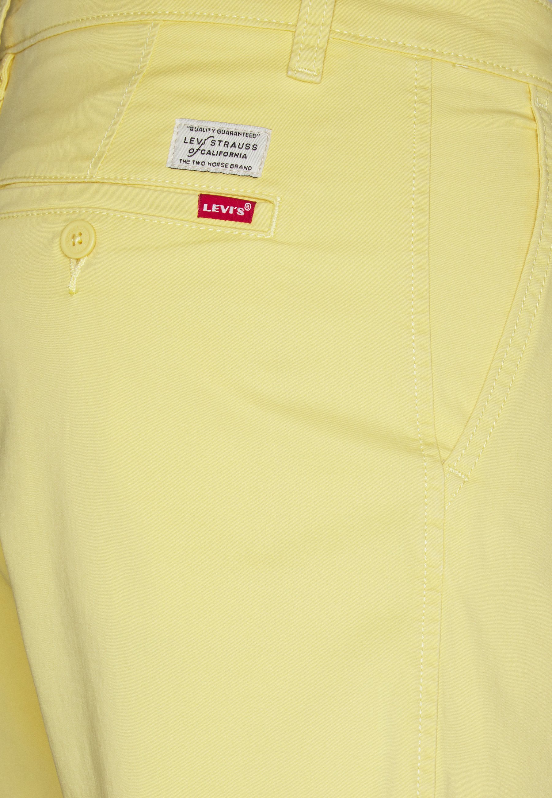 yellow levi shorts