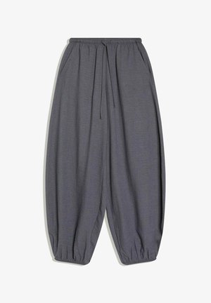 Ohlapne temno sive hlače z elastičnim pasom, vezalko, bočnimi žepi in elastičnimi manšetami na gležnjih.