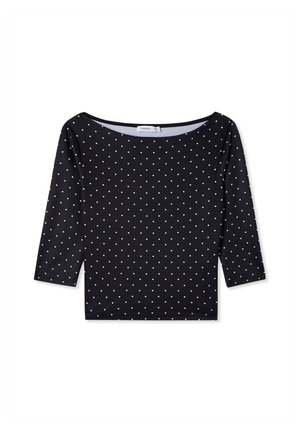 Top nero a maniche lunghe con scollo ampio, caratterizzato da un motivo a pois bianchi. Realizzato in un tessuto morbido e elasticizzato.