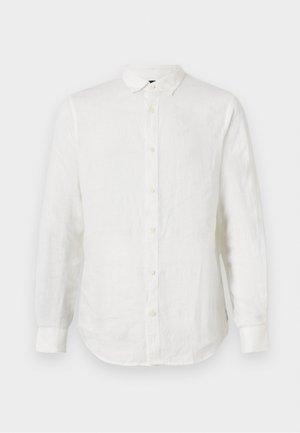 Hvidt linned langærmet skjorte med krave, frontknaplukning og afrundet kant. Har en subtil tekstur og slim fit.