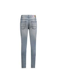 Jeans skinny in denim blu chiaro. Le caratteristiche includono una vita alta, cinque tasche e un'etichetta colorata "RTR" sulla cintura posteriore.