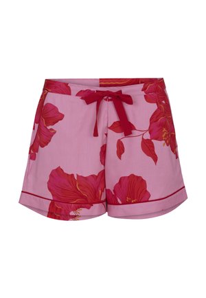 Różowe szorty z dużym czerwonym kwiatowym wzorem, czerwonym wiązaniem z przodu oraz czerwonym obszyciem na dole, prezentowane na białym tle.