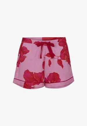 Pink shorts with large red floral print, a red front tie, and red piping along the hem, displayed on a white background.