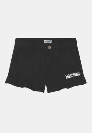 Schwarze Baumwollshorts mit rüschengesäumtem Saum, vorderen Taschen und einem goldenen Knopf an der Taille, mit dem weißen "MOSCHINO"-Logo an der Seite.