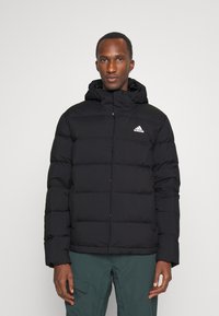 adidas Sportswear - HELIONIC HOODED DOWN - Piumino - black Immagine in miniatura 1