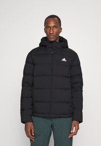 adidas Sportswear - HELIONIC HOODED DOWN - Jachetă cu puf - black Imagine miniatură 1