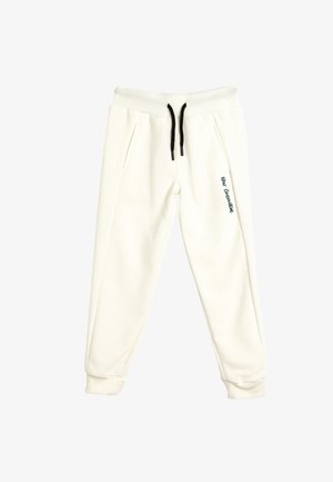 Weiße Sweatpants mit einer gerippten Textur, ausgestattet mit schwarzen Kordeln und Seitentaschen. "New Generation" ist in Grün am Bein gestickt.