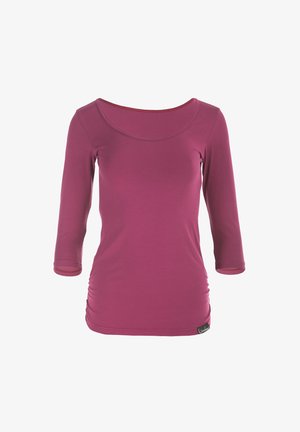 Hosszú ujjú felső sötét bogyószínből, puha anyagból készült, különleges, kör alakú nyakkivágással és redős részletekkel az oldalán.