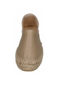 Beige leather slip-on shoe with braided jute sole, rounded toe, and minimalistic design. Smooth texture and subtle stitching detail.