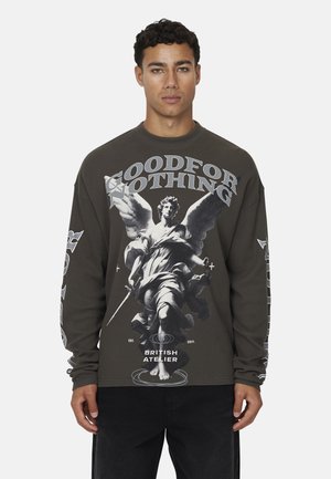 Grauer Langarm-Sweatshirt mit fettem "GOOD FOR NOTHING"-Text und einem grafischen Druck eines klassischen Engels, der ein Schwert hält.