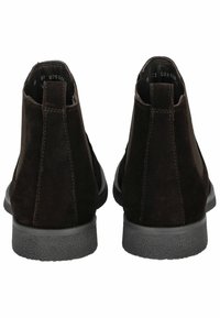 Stivali ankle in suede marrone con una superficie liscia, pannelli laterali elastici e suole in gomma. La parte posteriore ha un design minimalista e un tacco arrotondato.