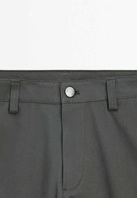 Gray tailored trousers with a smooth texture, featuring a silver button closure, belt loops, and front pockets.