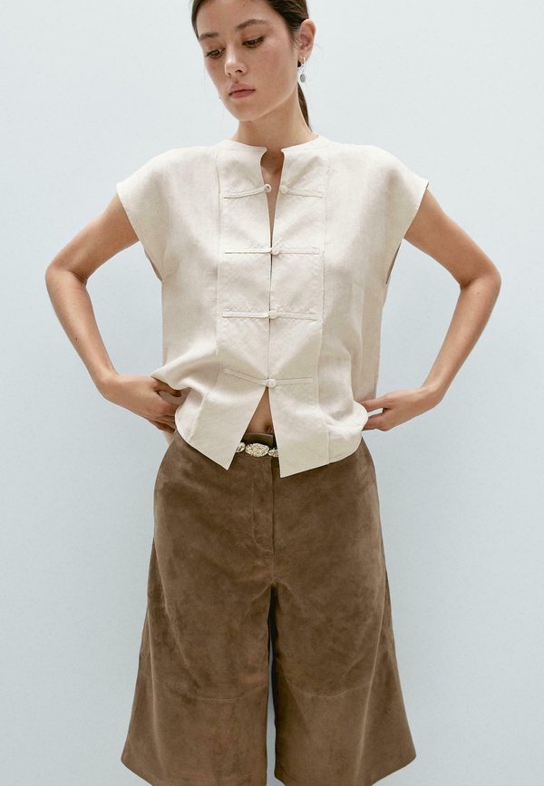 DETAILS  - Waistcoat - beige