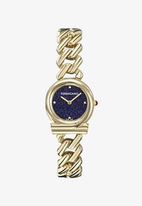 Seleccionado, gold-coloured