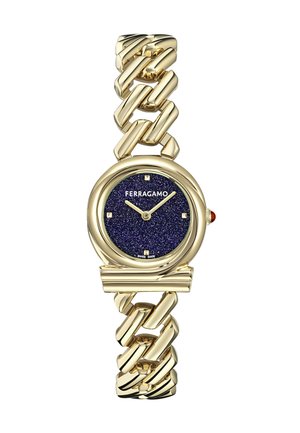Gold-tone watch with a chain link bracelet. Round face features a navy blue glitter dial, gold hour markers, and a red accent on the crown.
