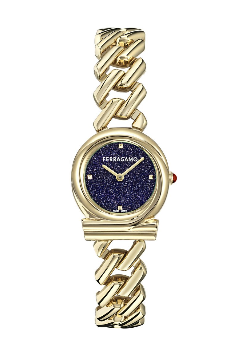 Gold-tone watch with a chain link bracelet. Round face features a navy blue glitter dial, gold hour markers, and a red accent on the crown.