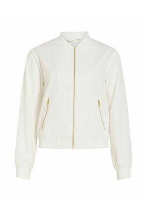 Blouson aviateur blanc avec fermeture éclair dorée à l'avant et deux poches latérales zippées en or, manches longues et poignets et ourlet côtelés.