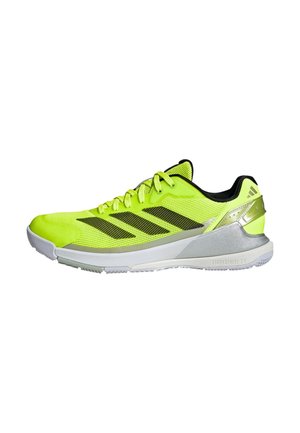 Neon yellow and black Adidas athletic shoe with mesh upper, white midsole, silver heel support, and three black stripes on the side.