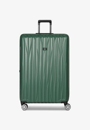 Valigia rigida verde con un design ondulato testurizzato, due ruote, manico retrattile e un logo del marchio sul frontale.