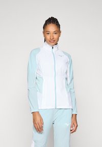 Leichte Jacke in Weiß und Hellblau, mit Reißverschluss, Stehkragen und elastischen Bündchen. Verfügt über seitliche Taschen und ein Logo-Detail.