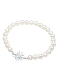 Pärlarmband med runda vita pärlor och en silverfärgad blommig lås. Slät yta med enhetlig storlek och växelvisa ytor.