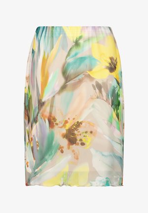 Jupe longueur genou avec imprimé aquarelle floral et papillons en jaune, vert, sarcelle et marron sur fond beige clair.