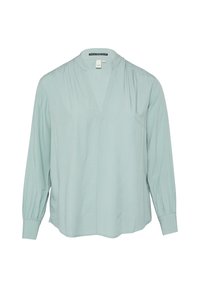Lichtblauwe blouse met lange mouwen, een V-hals en geplooide schouderdetails. Gemaakt van een soepele stof met een losse, ontspannen pasvorm.