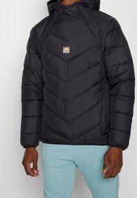 Ellesse Trainingsjacke - black