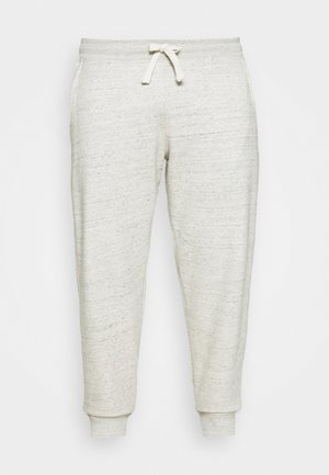 Pantaloni de jogging gri deschis, confecționați dintr-un material moale și texturat. Au o talie elastică cu șnur și manșete ajustate la glezne.