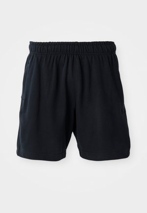 Svarta sportshorts tillverkade av mjukt material, med resår i midjan och två sidofickor för bekvämlighet.