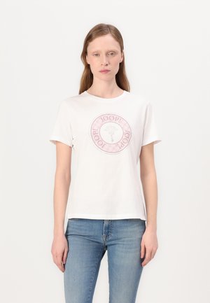 White cotton t-shirt with short sleeves, featuring a pink circular logo design at the front. The fabric appears smooth with a relaxed fit.