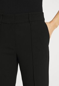 Stylein BEN - Tygbyxor - black