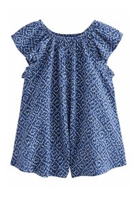 Haut bleu à motifs avec des manches volantées, présentant un design en diamant et points blancs. Tissu doux, coupe ample et encolure élastiquée.