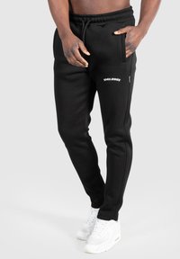 Smilodox MERRICK - Træningsbukser - schwarz