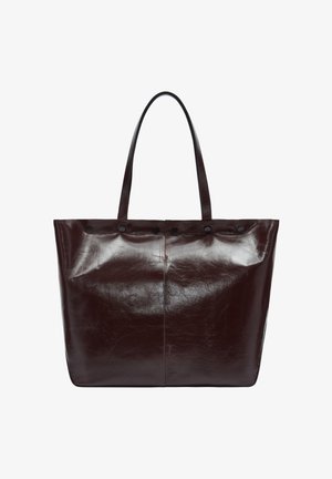 Brązowa skórzana torba tote o błyszczącym wykończeniu, z podwójnymi uchwytami i subtelnymi detalami w postaci przeszyć, z okrągłymi czarnymi akcentami wzdłuż górnej krawędzi.