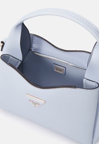 Guess IWONA - Handtas - sky blue