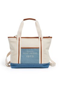 Plátěná taška v krémové a modré barvě, s hnědými koženými akcenty a logem. Zapínání na zip a dvojité rukojeti pro pohodlné nošení.