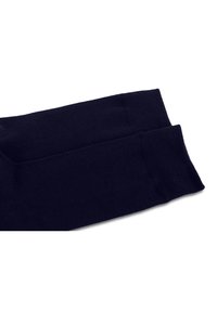 Calcetines azul marino hechos de una suave mezcla de algodón. Presentan puños acanalados y una textura lisa con un diseño sin costuras para mayor confort.