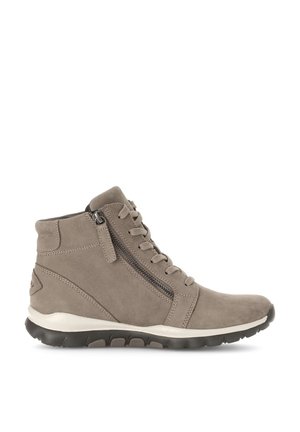 Taupe suede ankle boot with side zipper, laces, padded collar, and black rubber sole with white midsole.