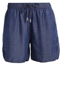 Laivansiniset sortsit, joissa on valkoisia pilkkuja, valmistettu kevyestä kankaasta, ja joissa on joustava vyötärö, kiristysnarut ja sivutaskut.