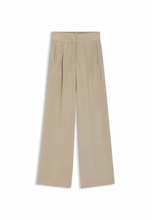 Pantalon beige à jambes larges avec une taille haute, doté de poches latérales et d'une texture lisse. Lignes épurées et détails de couture minimaux.